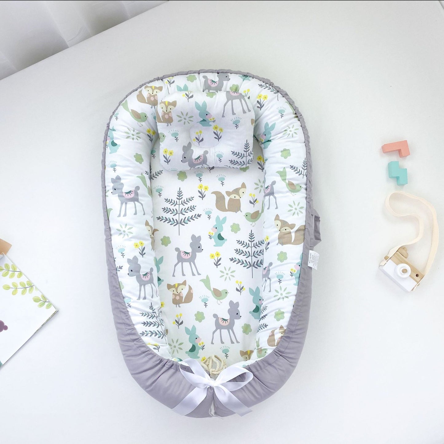 The SnuggleHaven Portable Baby Nest